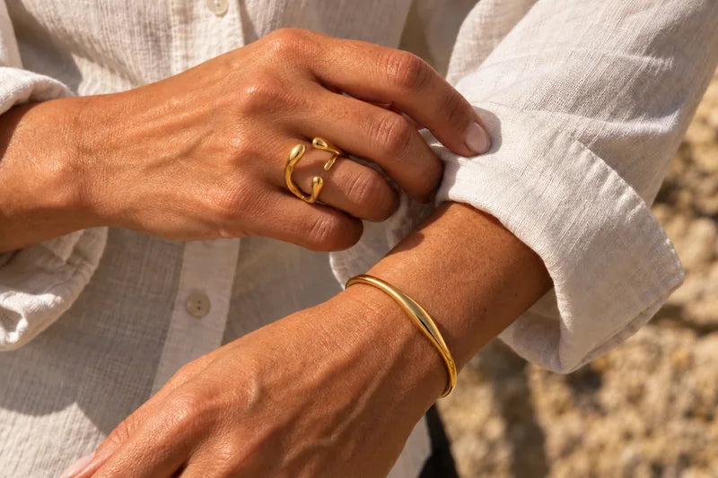 Drift Ring and Lysa Bracelet worn with an ivory shirt
